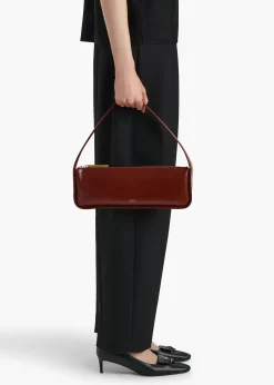 Khaite Shoulder Bags-Lori Baguette Bag in Bordeaux Crackle Patent Leather