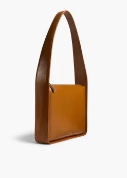 Khaite Shoulder Bags-Lori Squared Bag in Dark Honey Crackle Patent Leather