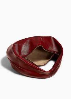 Khaite Shoulder Bags-Medium Olivia Hobo in Oxblood Crackle Patent Leather