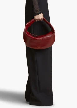 Khaite Shoulder Bags-Medium Olivia Hobo in Oxblood Crackle Patent Leather