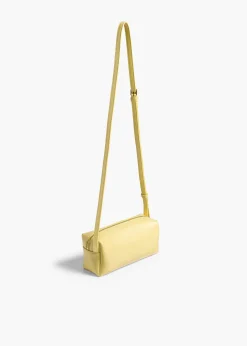 Khaite Crossbody Bags-Mini Kye Crossbody Bag in Pale Yellow Crackle Patent Leather