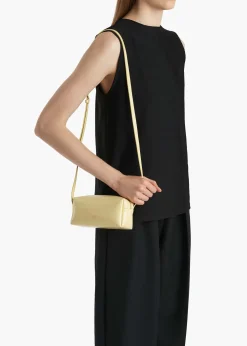 Khaite Crossbody Bags-Mini Kye Crossbody Bag in Pale Yellow Crackle Patent Leather
