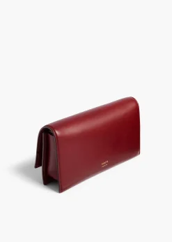 Khaite Evening-Sculpted Hand Clutch in Oxblood Leather